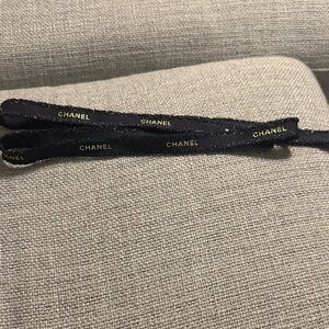 CHANEL Black and Gold Ribbon